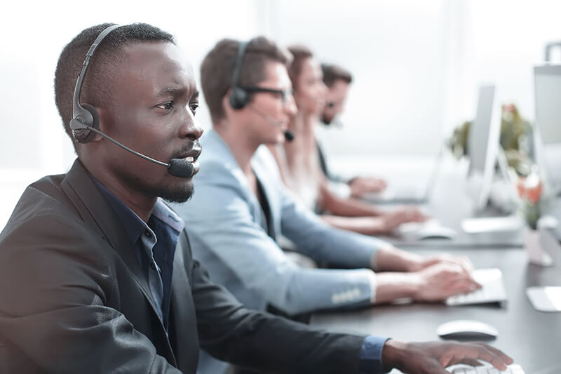 african-american-male-with-headset-in-call-center-team